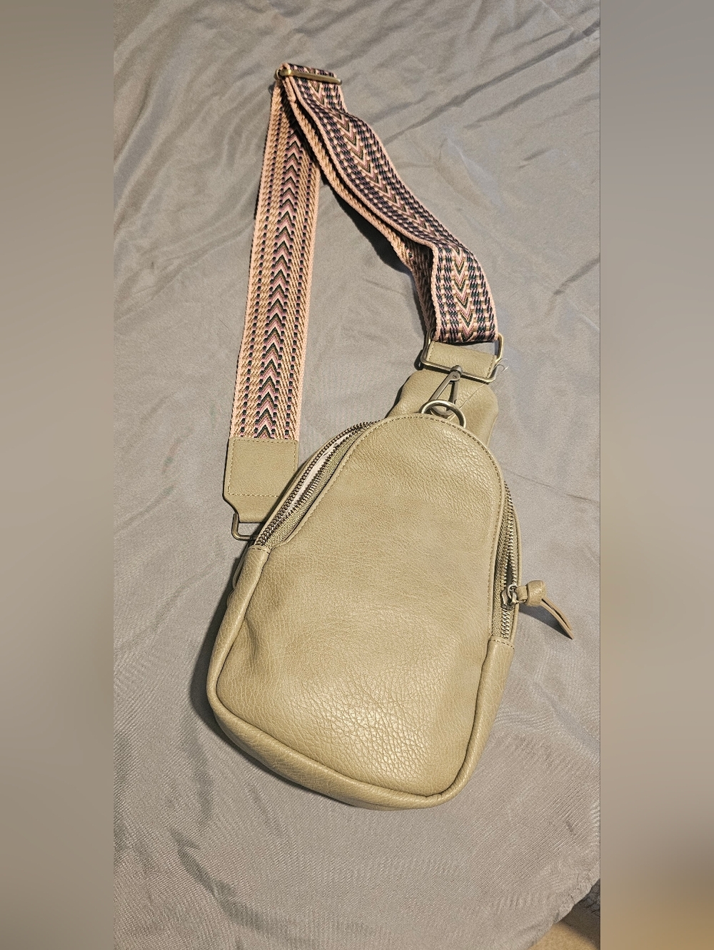 Anthropologie beige pebbled leather crossbody with gold logo tag